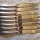 Set of 8 silver metal knives