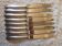 Set of 8 silver metal knives