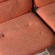 Strafor 3-seater bench, orange upholstery and sled base, 1970s.