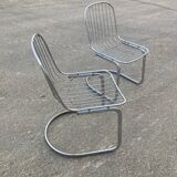 Two Gastone Rinaldi style chrome metal chairs.