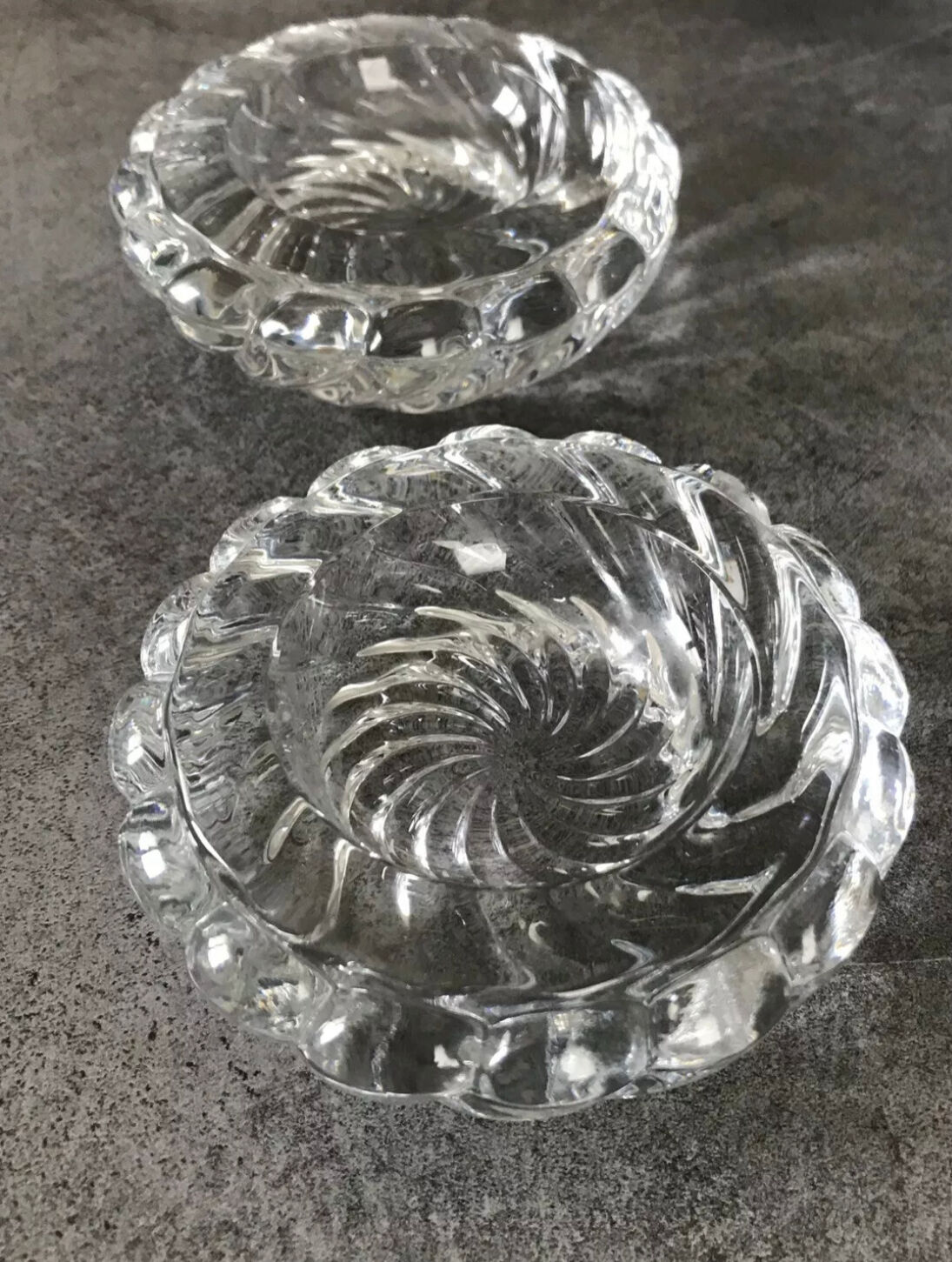 Pair of twisted round candlesticks in baccarat crystal stamped