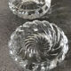 Pair of twisted round candlesticks in baccarat crystal stamped