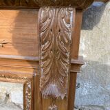 Old English style wooden fireplace