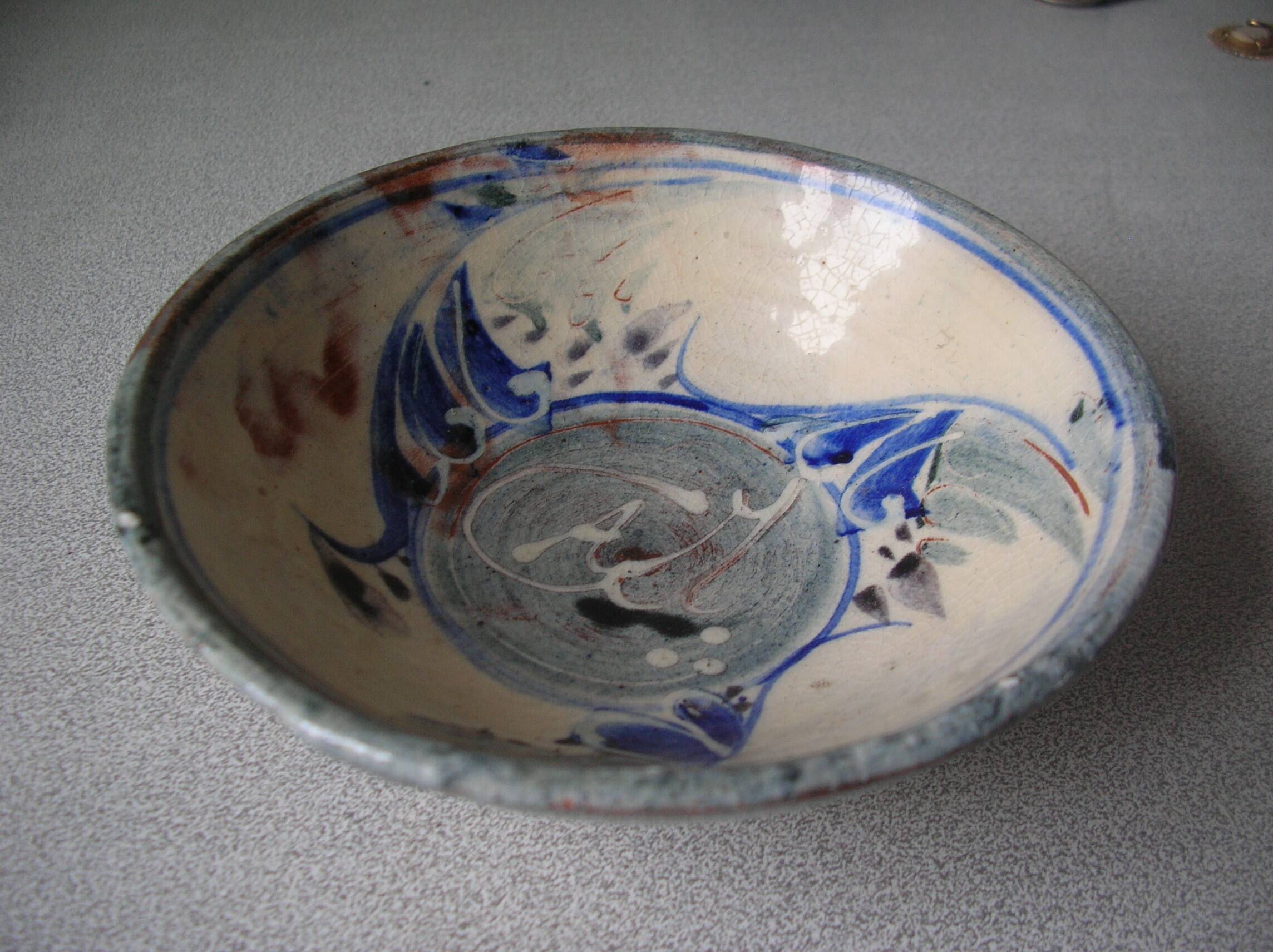 Old small bowl in enamelled terracotta, old earthenware