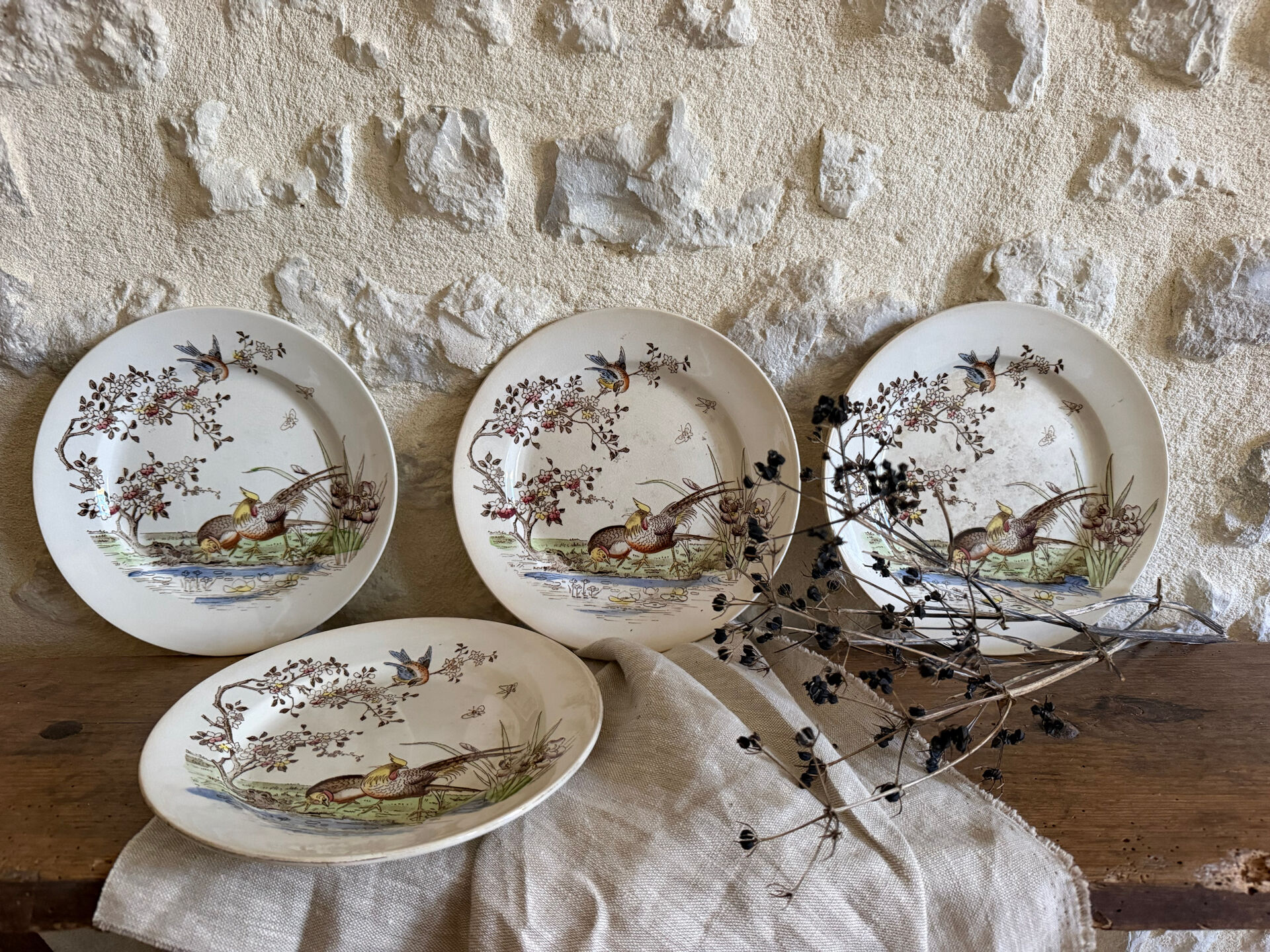 Polychrome ironstone dessert plates from Digoin and Sarreguemines.