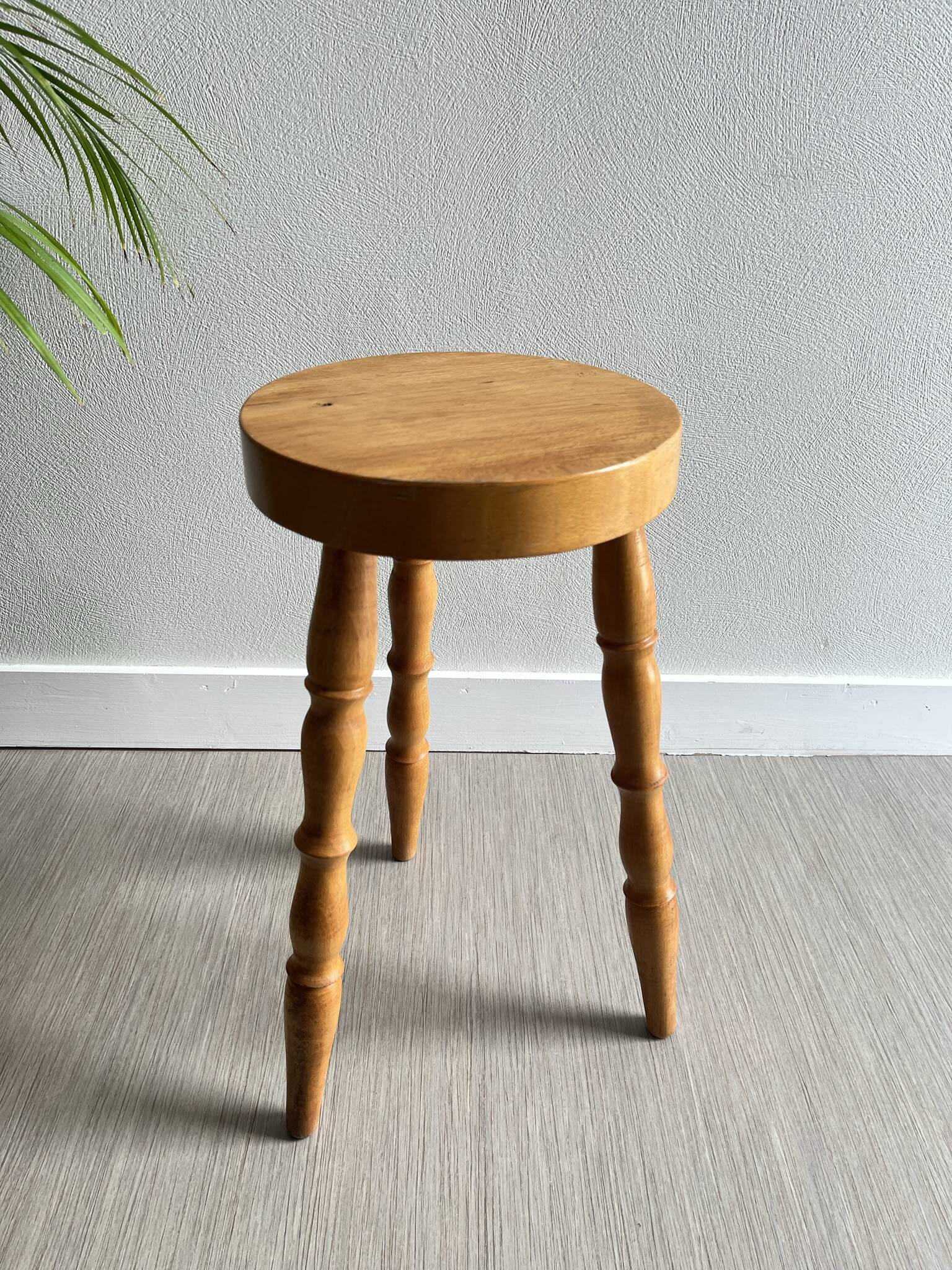 Wooden tripod stool