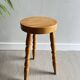 Wooden tripod stool