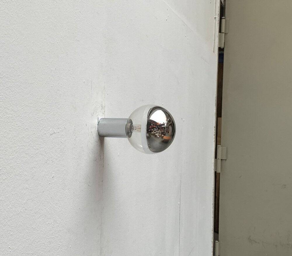 Vintage wall lamp from the German space age by Motoko Ishii for Staff, 1970s.