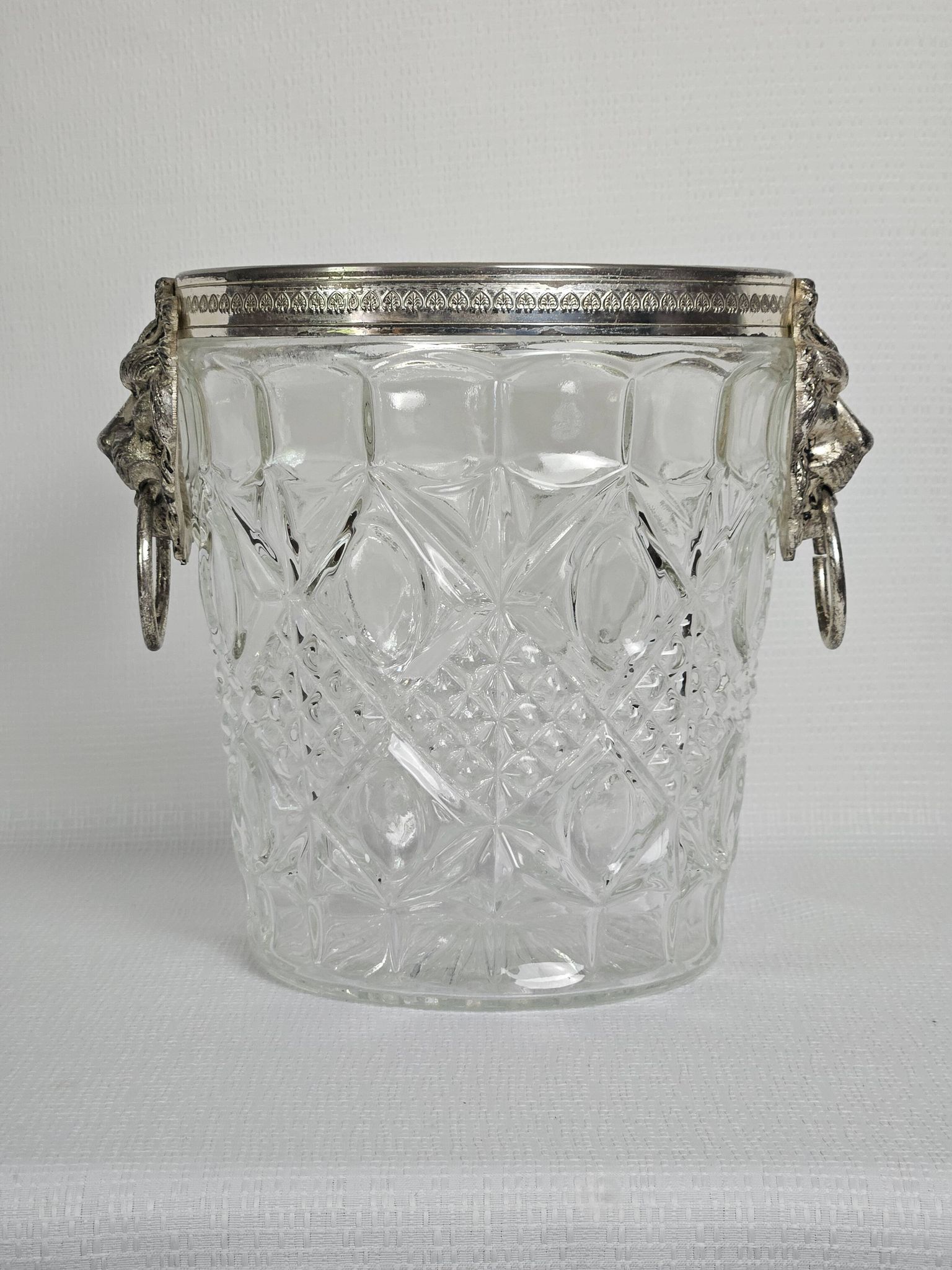 Lion head champagne bucket and its stand 20th century