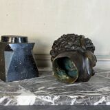 Head of a faun smiling, bronze after the antique, 19th century.