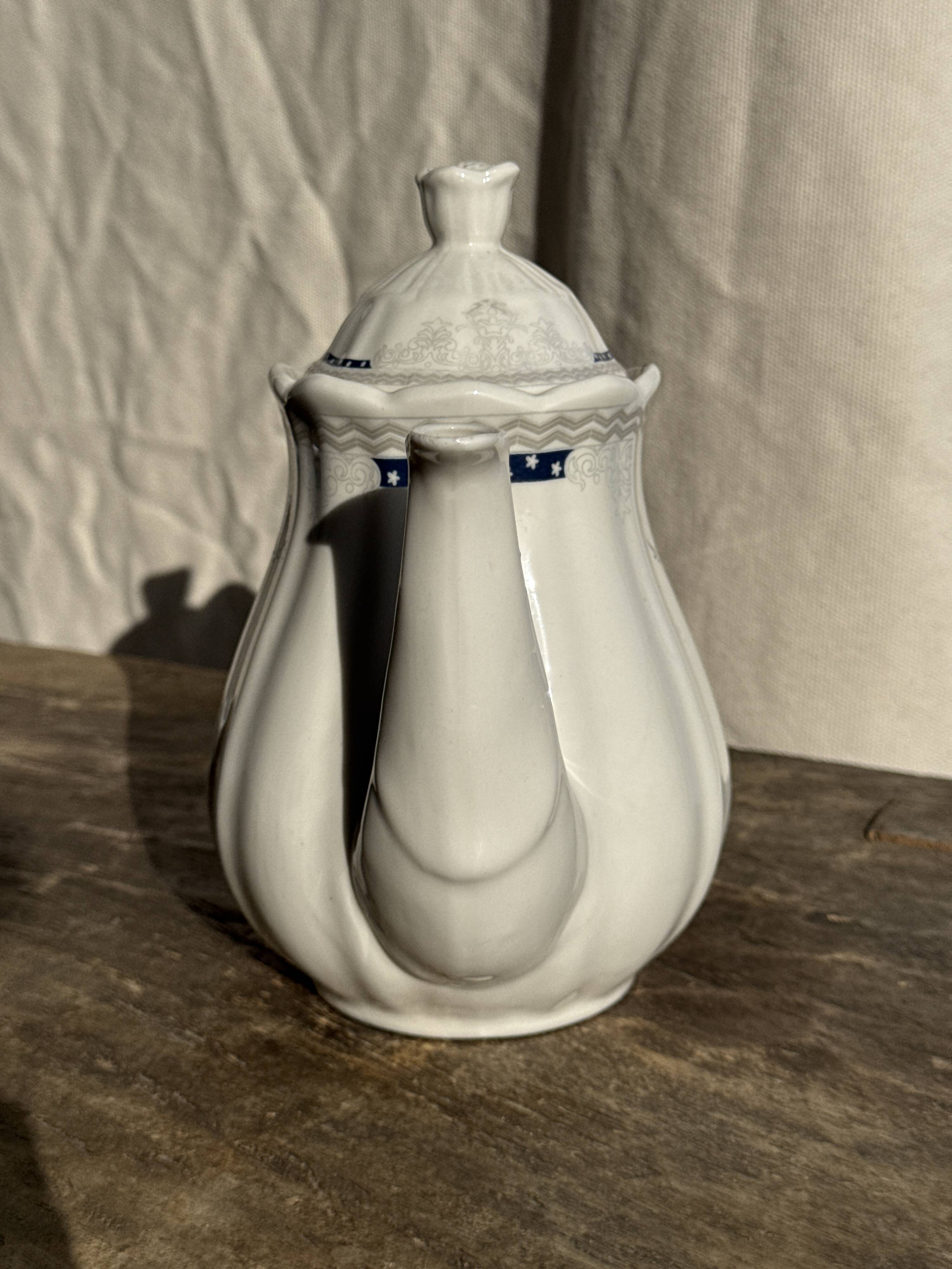 White earthenware teapot with blue and silver trim H22.5