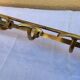 very beautiful wall-mounted coat rack wardrobe in brass from the 19th century