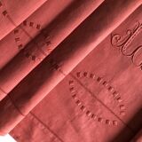 Old linen and cotton sheet in brick red