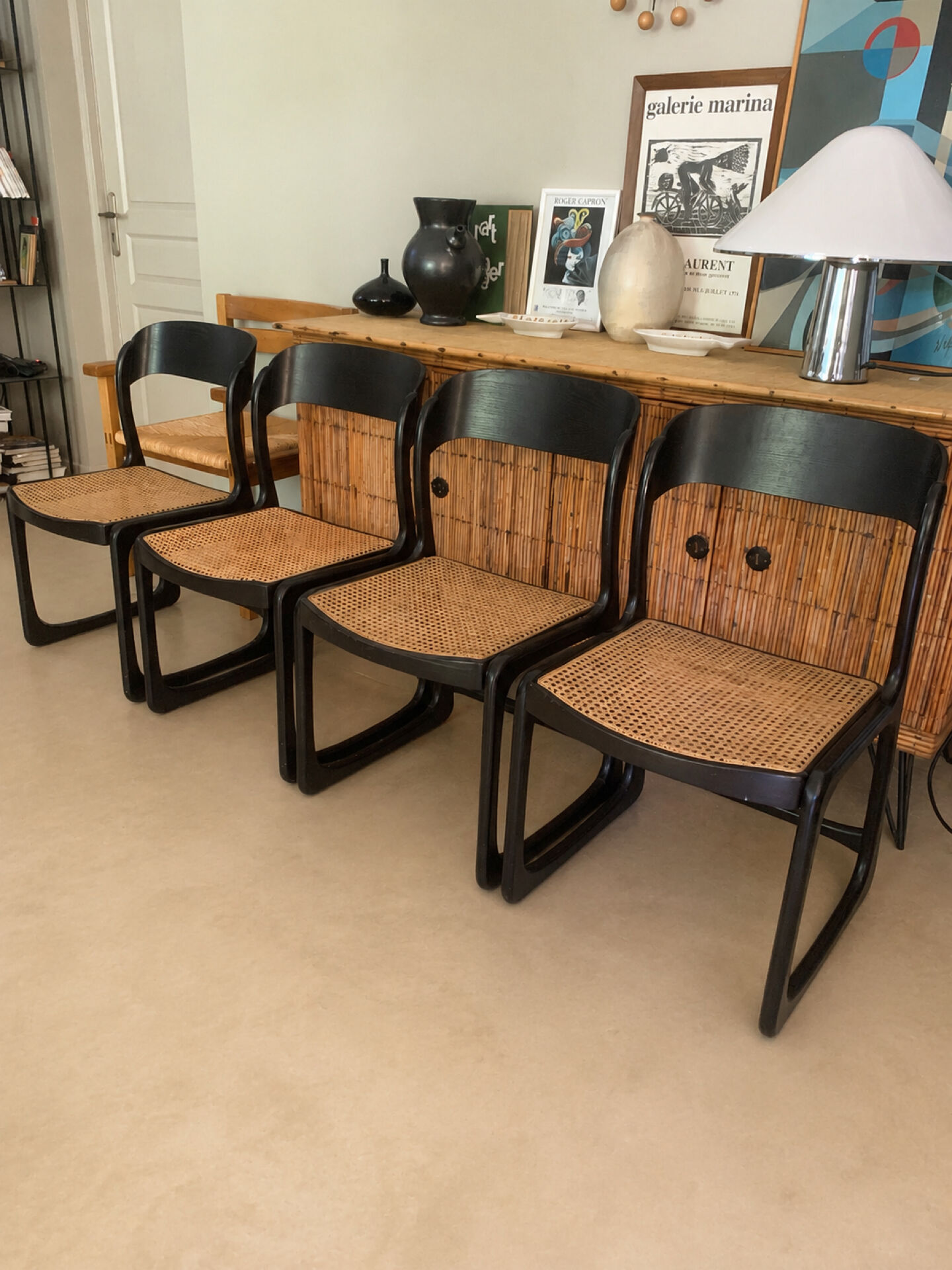 Set of 4 Baumann sled chairs with caning.