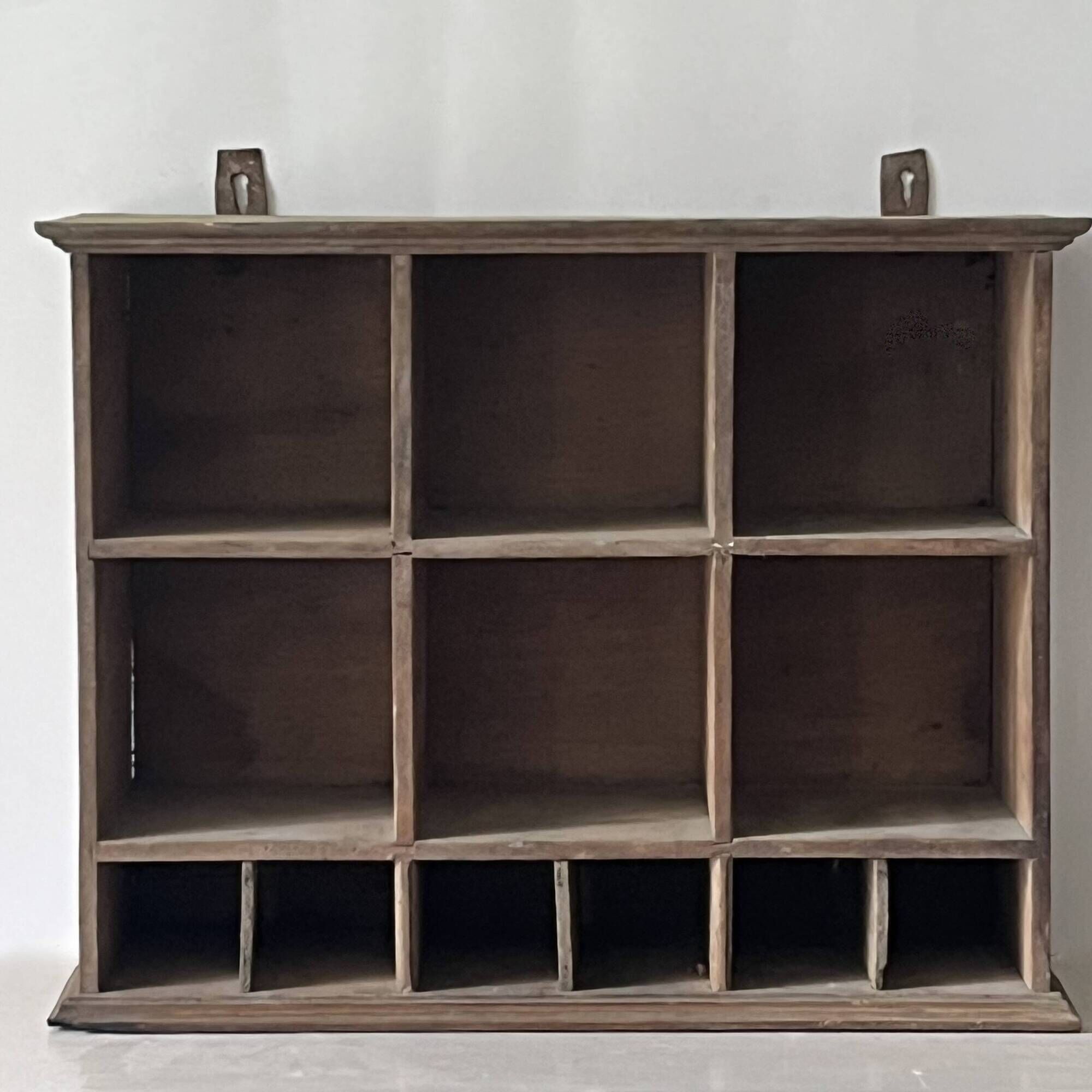 Antique commercial shelving unit with compartments