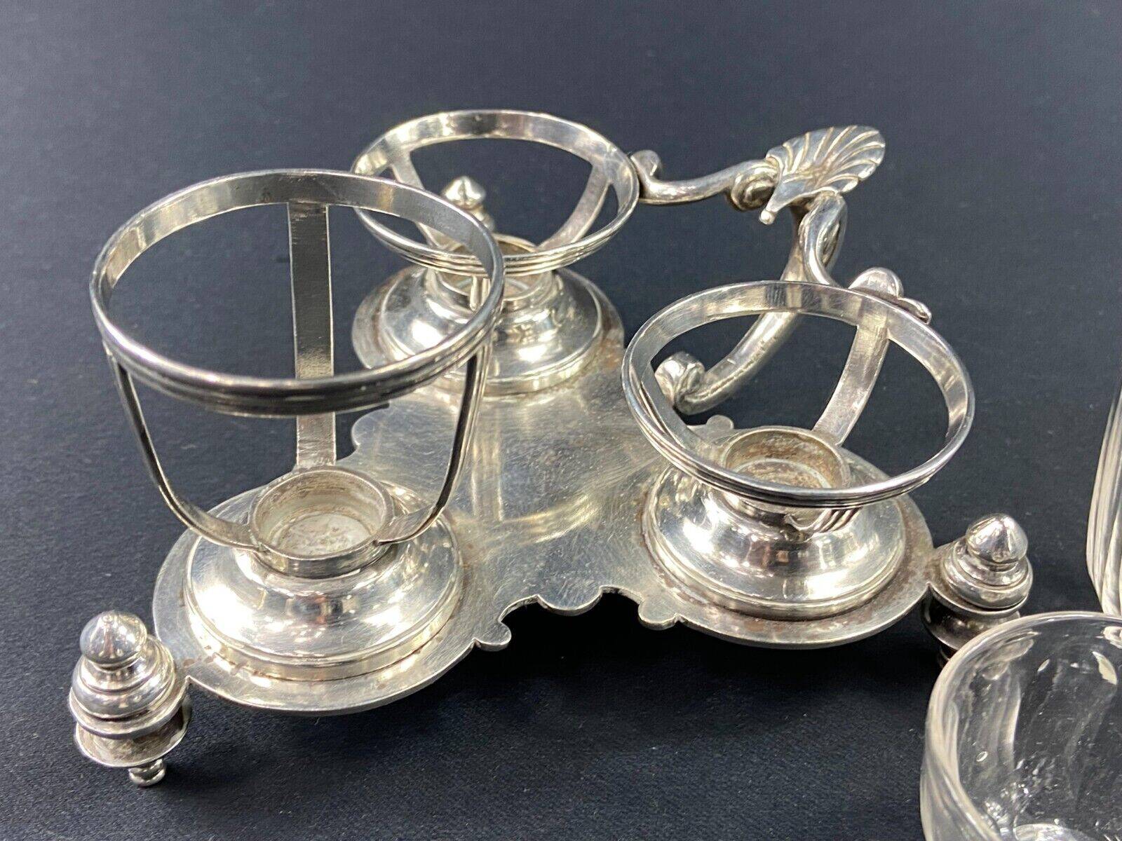 Porte salerons moutardier métal argenté et cristal XIXe décor coquille Louis XV