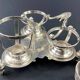 Porte salerons moutardier métal argenté et cristal XIXe décor coquille Louis XV