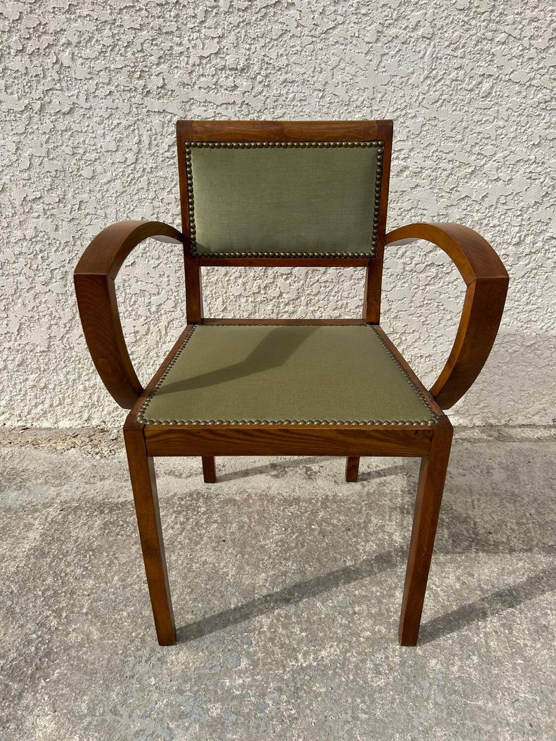 Pair of green velvet bridge armchairs