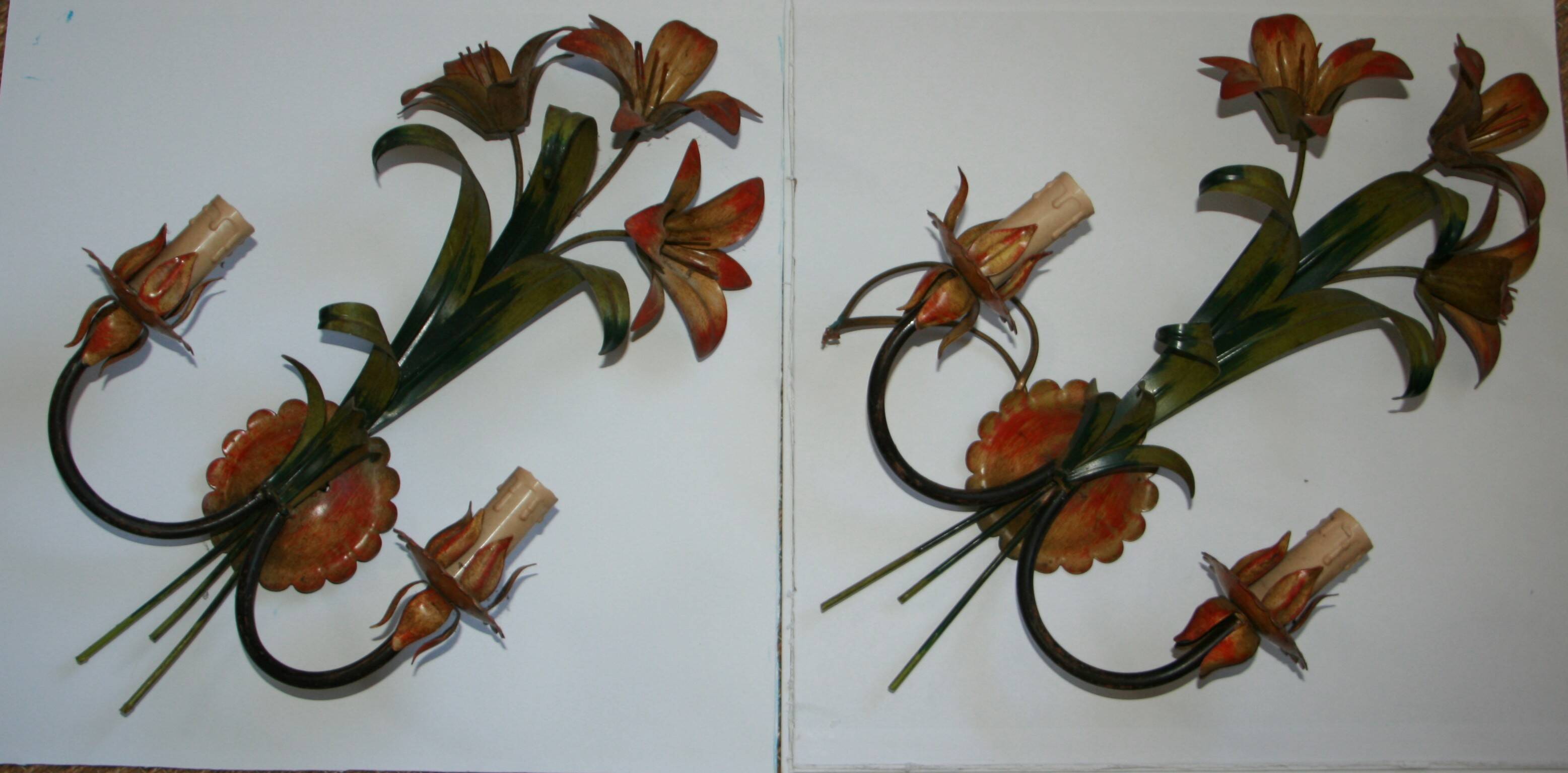 Pair of vintage floral wall sconces in Italian Florentine style metal.