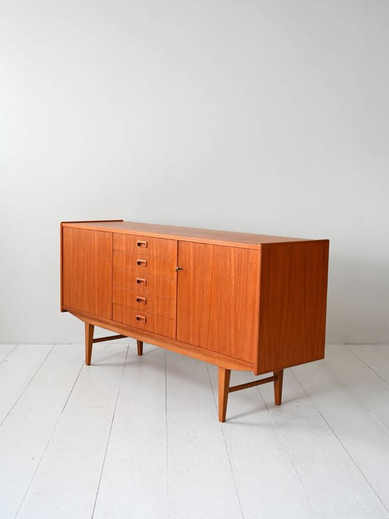 Danish sideboard in teak with central drawers. Denmark, late 1950s
