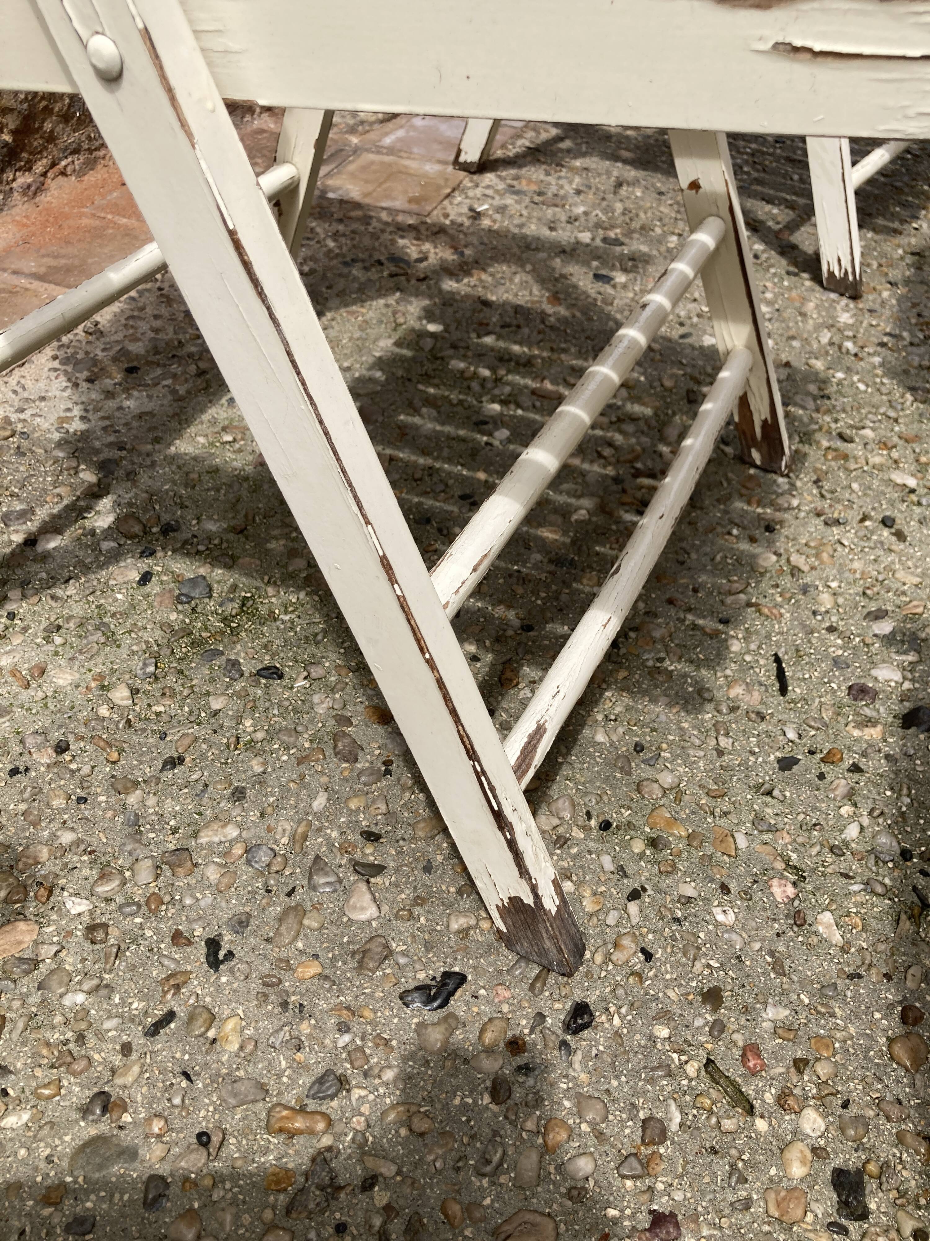 Five wooden garden armchairs