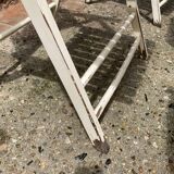 Five wooden garden armchairs