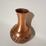 Sculpted copper vase