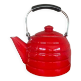 Old red enameled kettle
