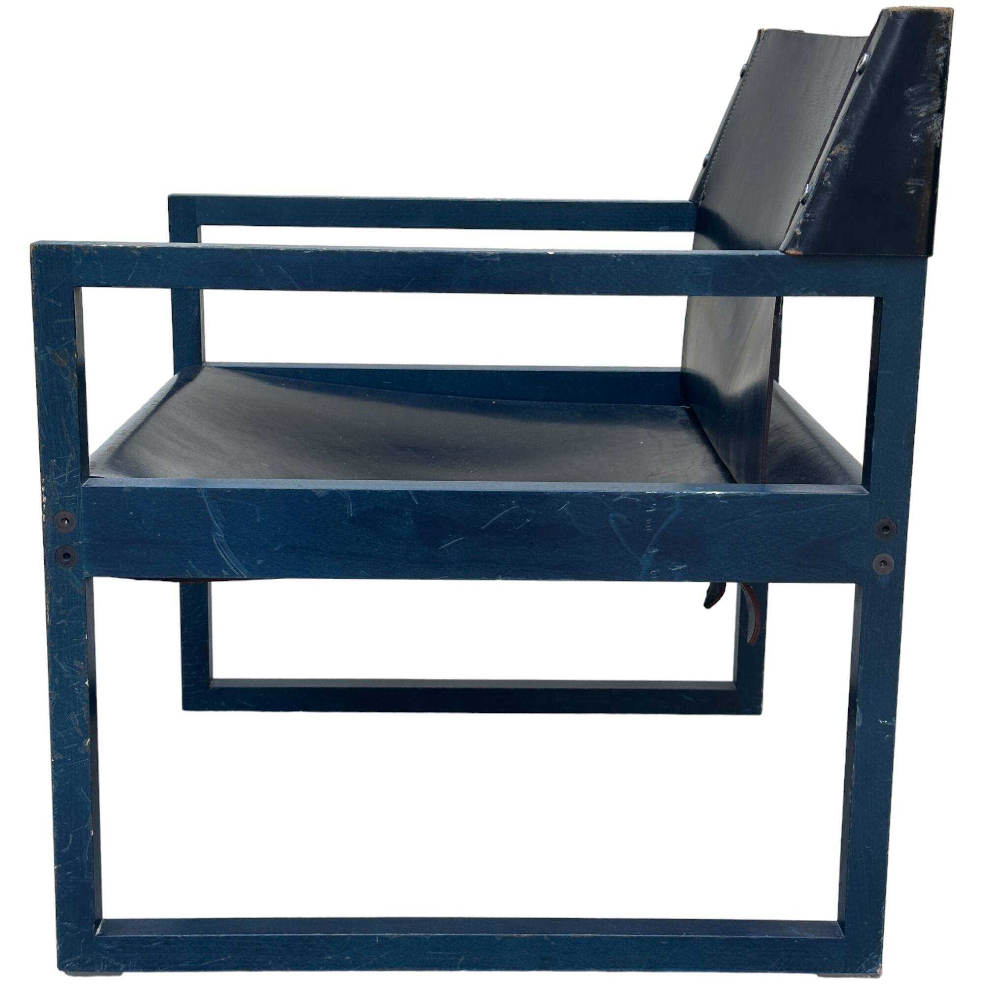 Postmodern lounge chair in black saddle leather and midnight blue wood, 1980.