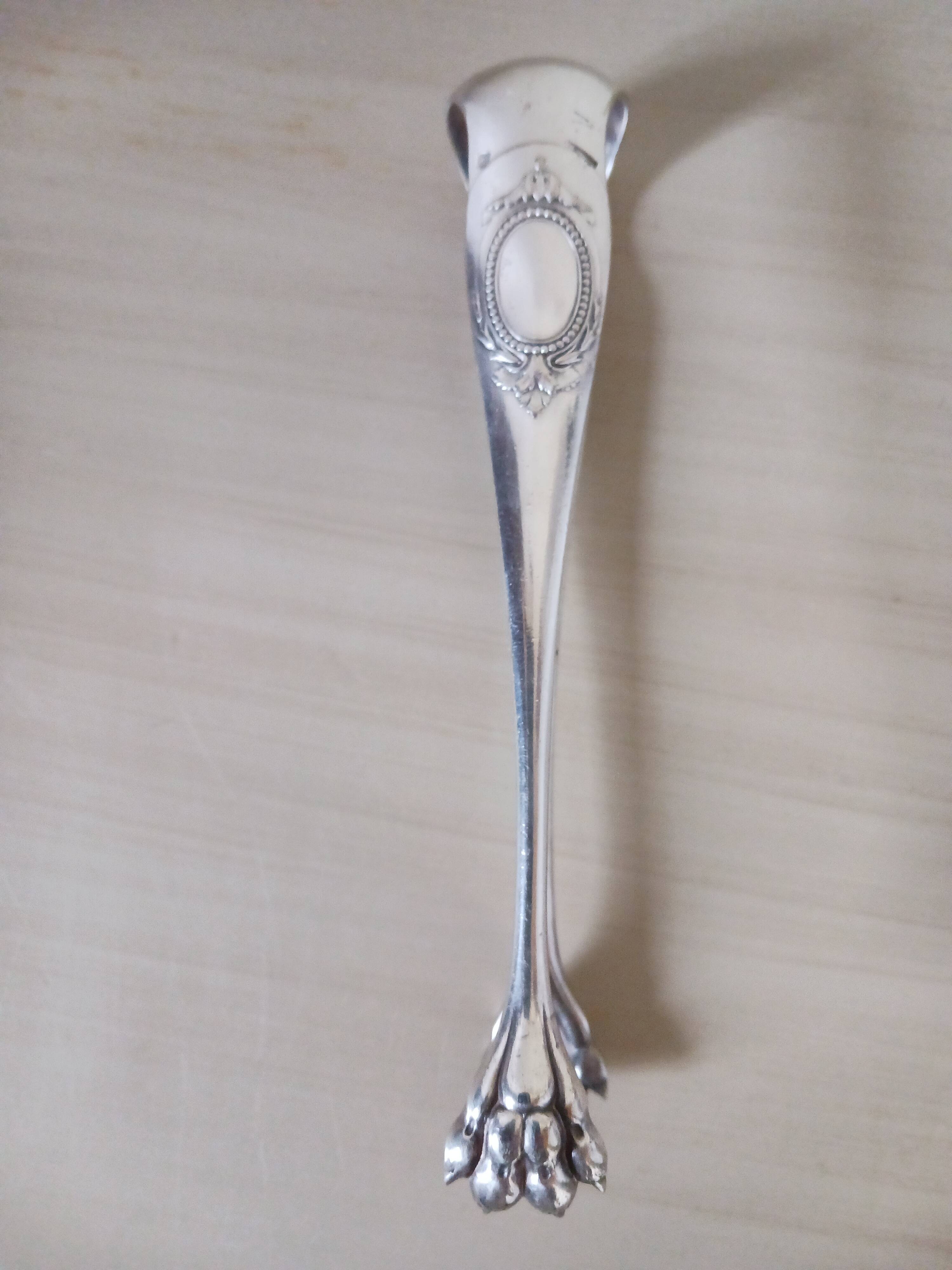 Christofle sugar tongs.