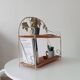 Vintage wall shelf or freestanding wicker in bohemian style.