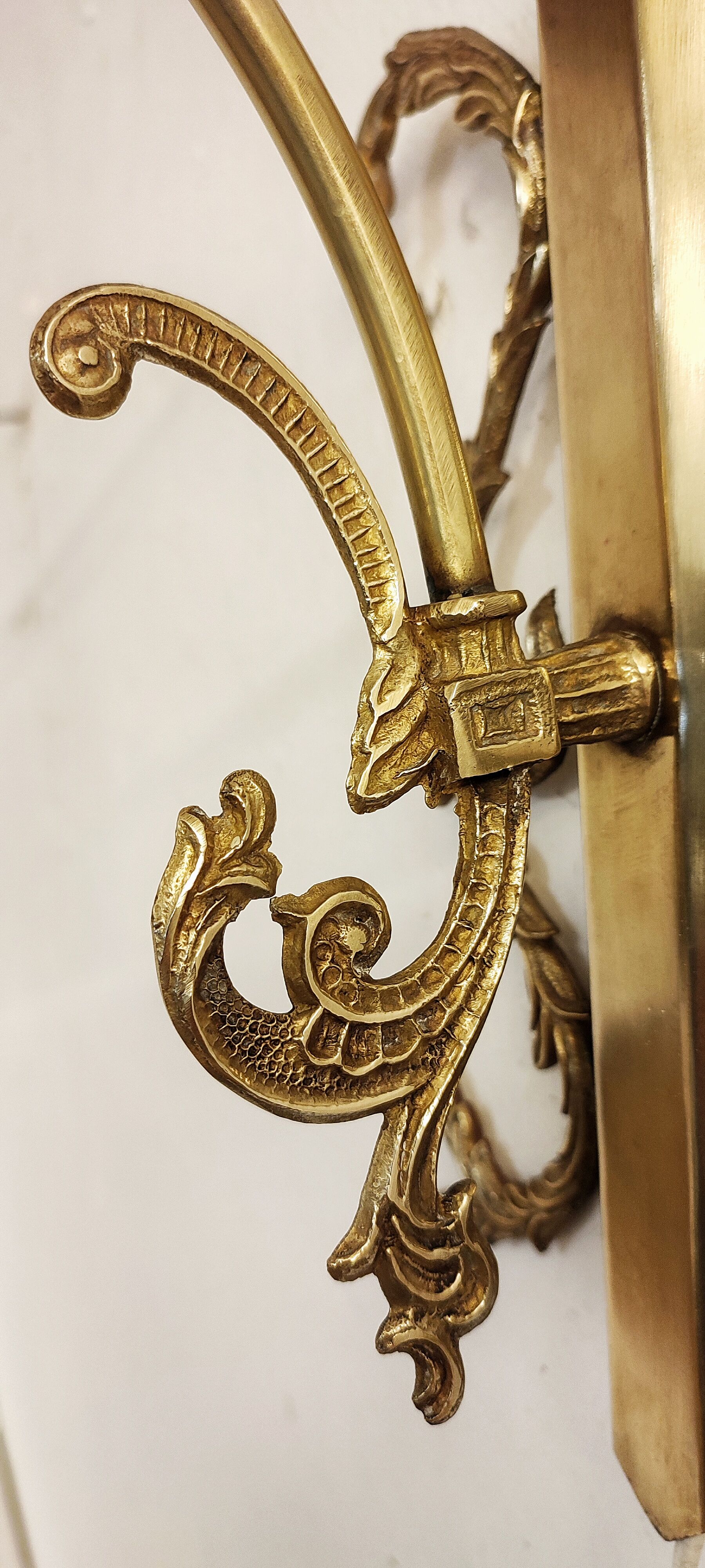 Bronze Modernist wall lamp. Spain, 1930s.