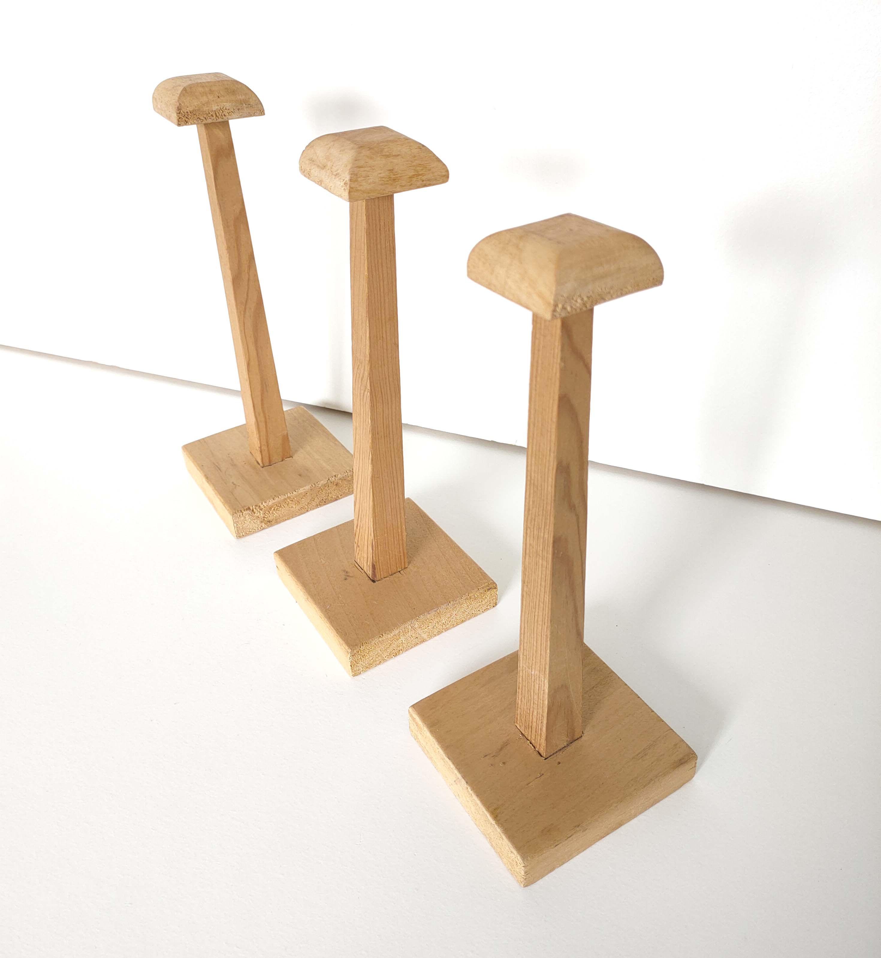 Trio wooden hats holders