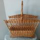 Old woven rattan magazine rack from the 1950s-60s