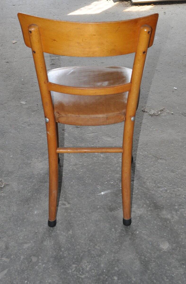 Vintage chair in brown faux leather and light wood, 1960s, padded seat.