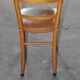 Vintage chair in brown faux leather and light wood, 1960s, padded seat.