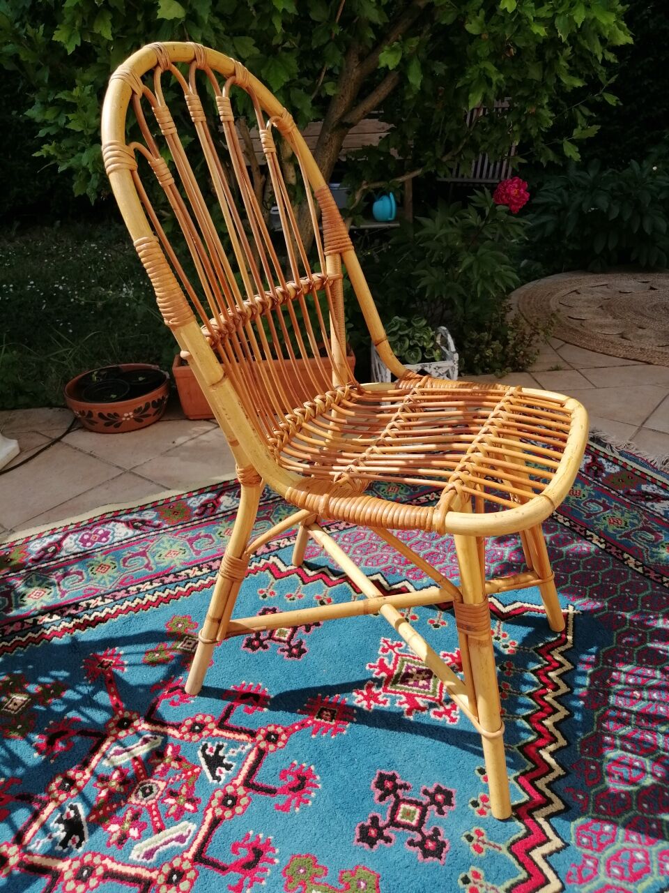 Series of 4 vintage rattan chairs.