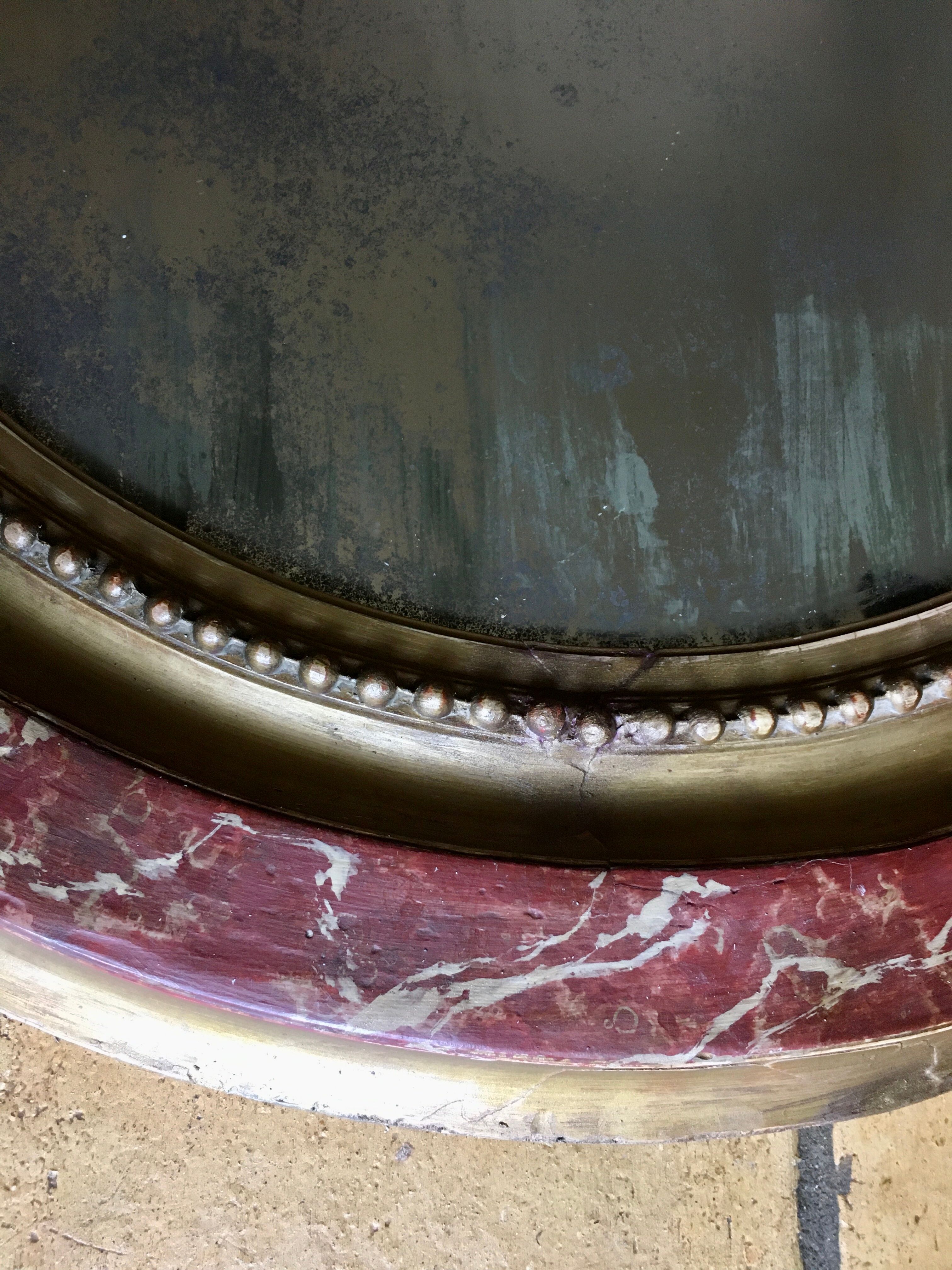 Oval gilded mirror 107x90cm