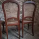 Set of 6 antique Louis XVI style dining chairs with caning.