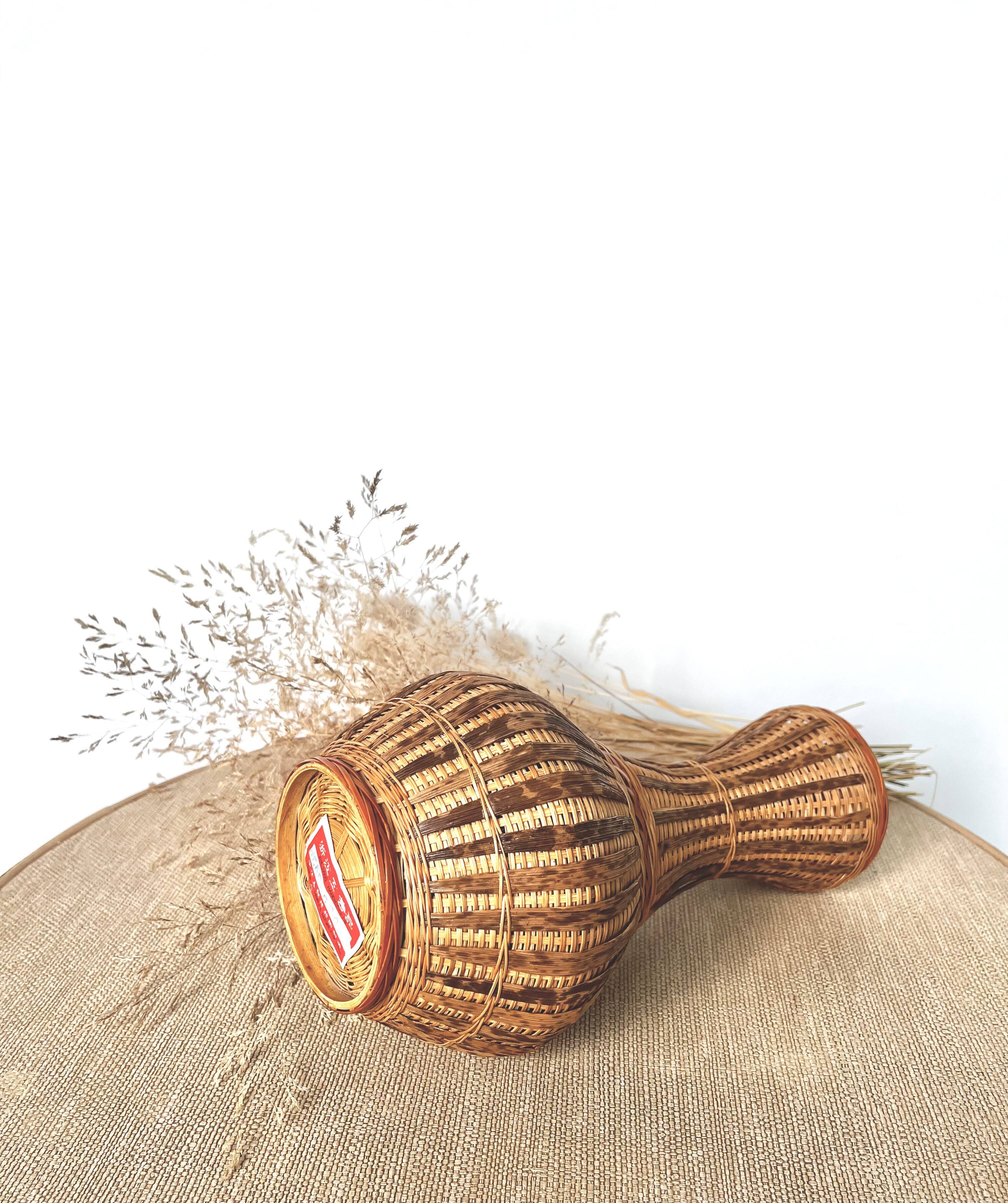 Wicker and woven bamboo vase