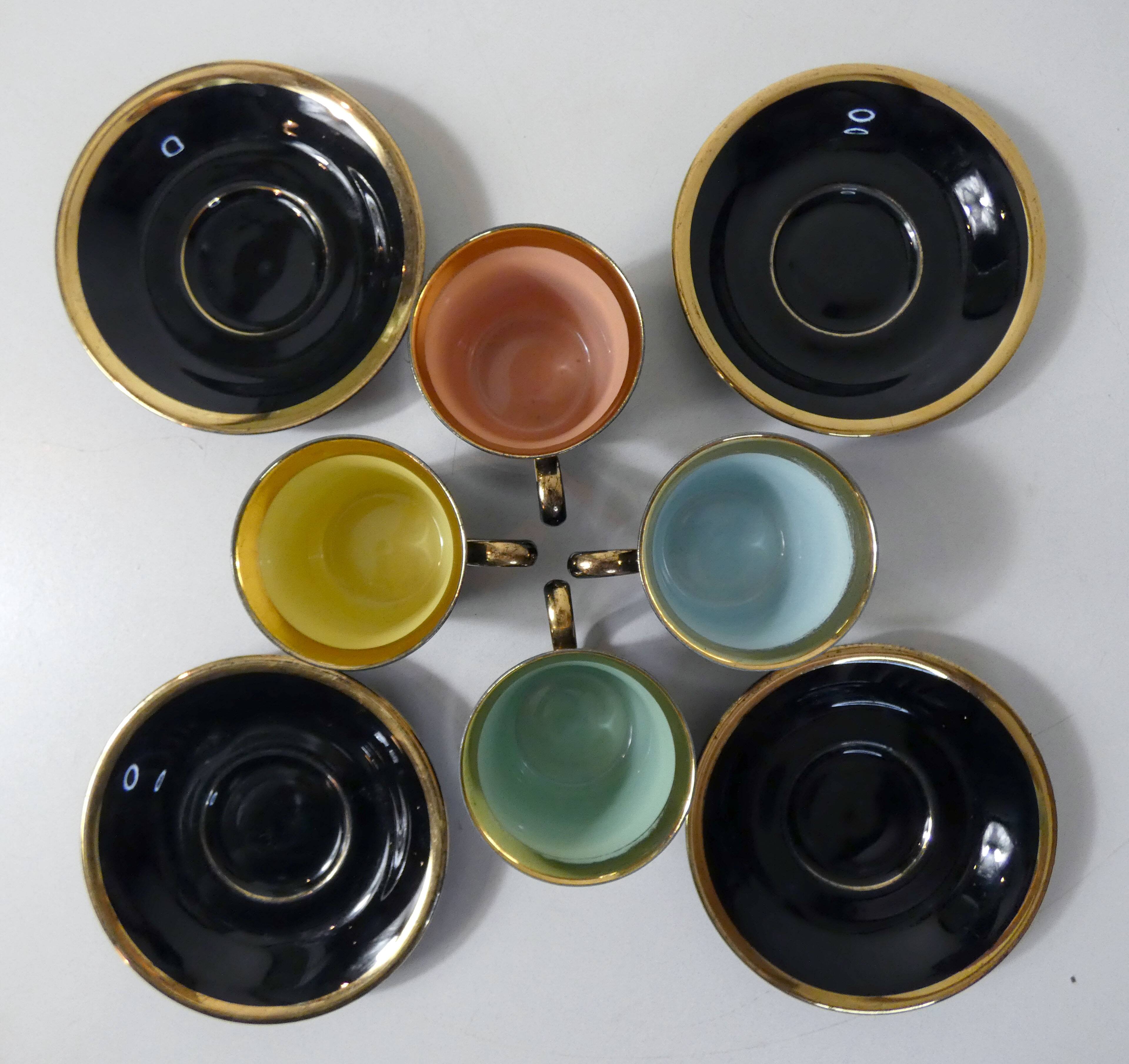 4 old black and gold cups in Vintage color