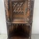 Gothic-style corner cabinet in solid oak, 20th century.