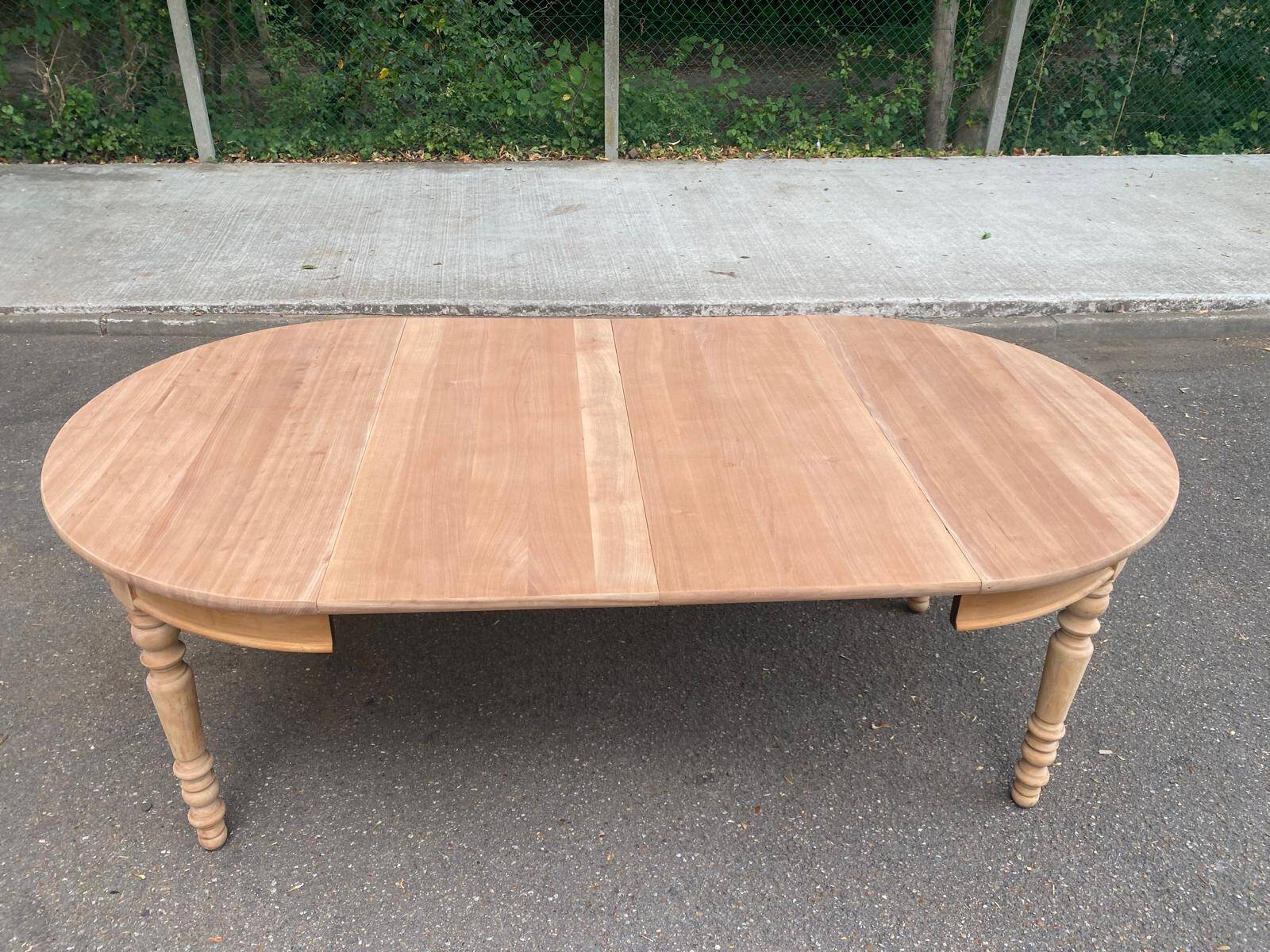 Round extendable dining table stripped in solid cherry wood France 1950