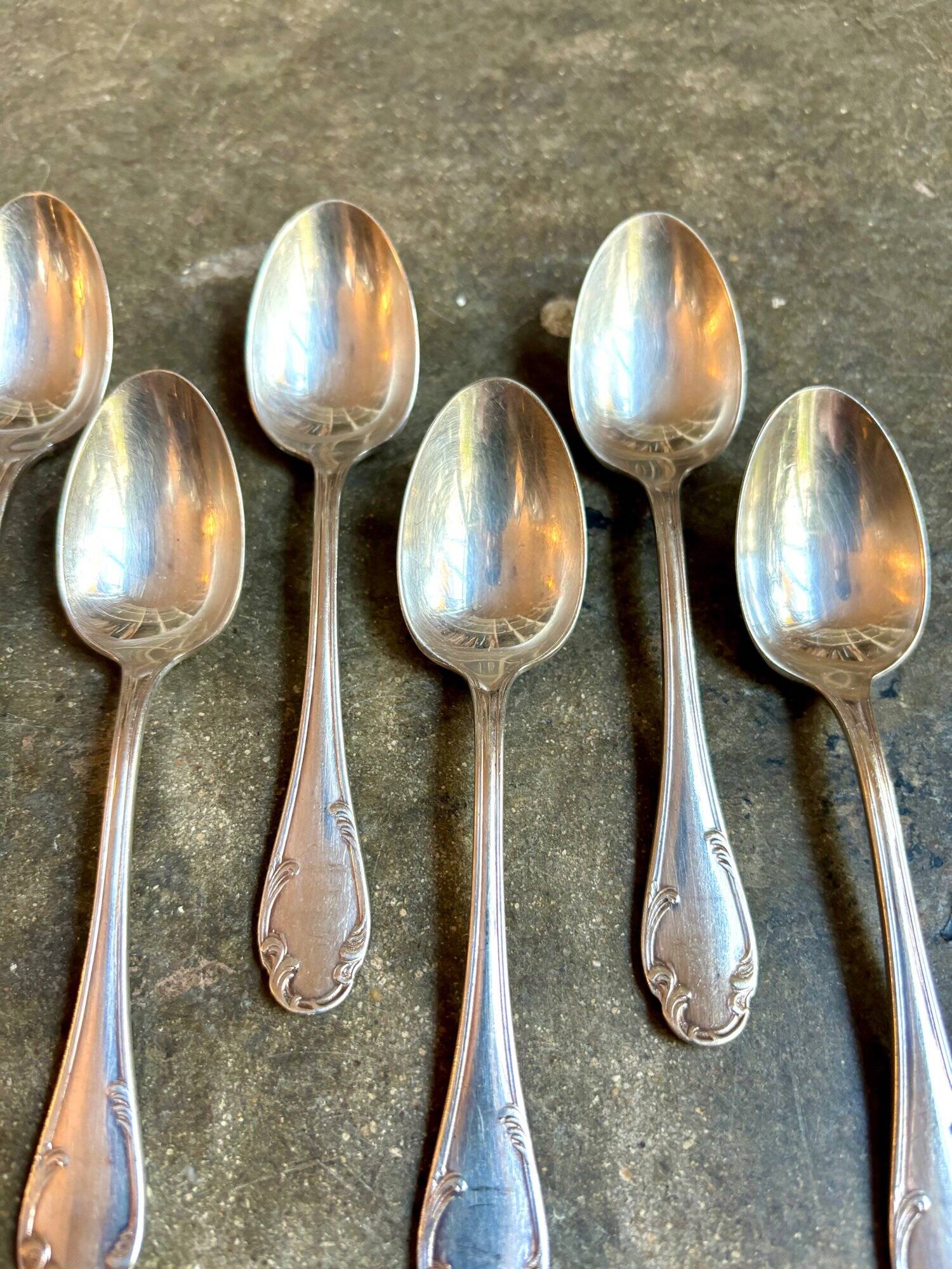 6 small silver metal spoons