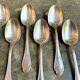 6 small silver metal spoons