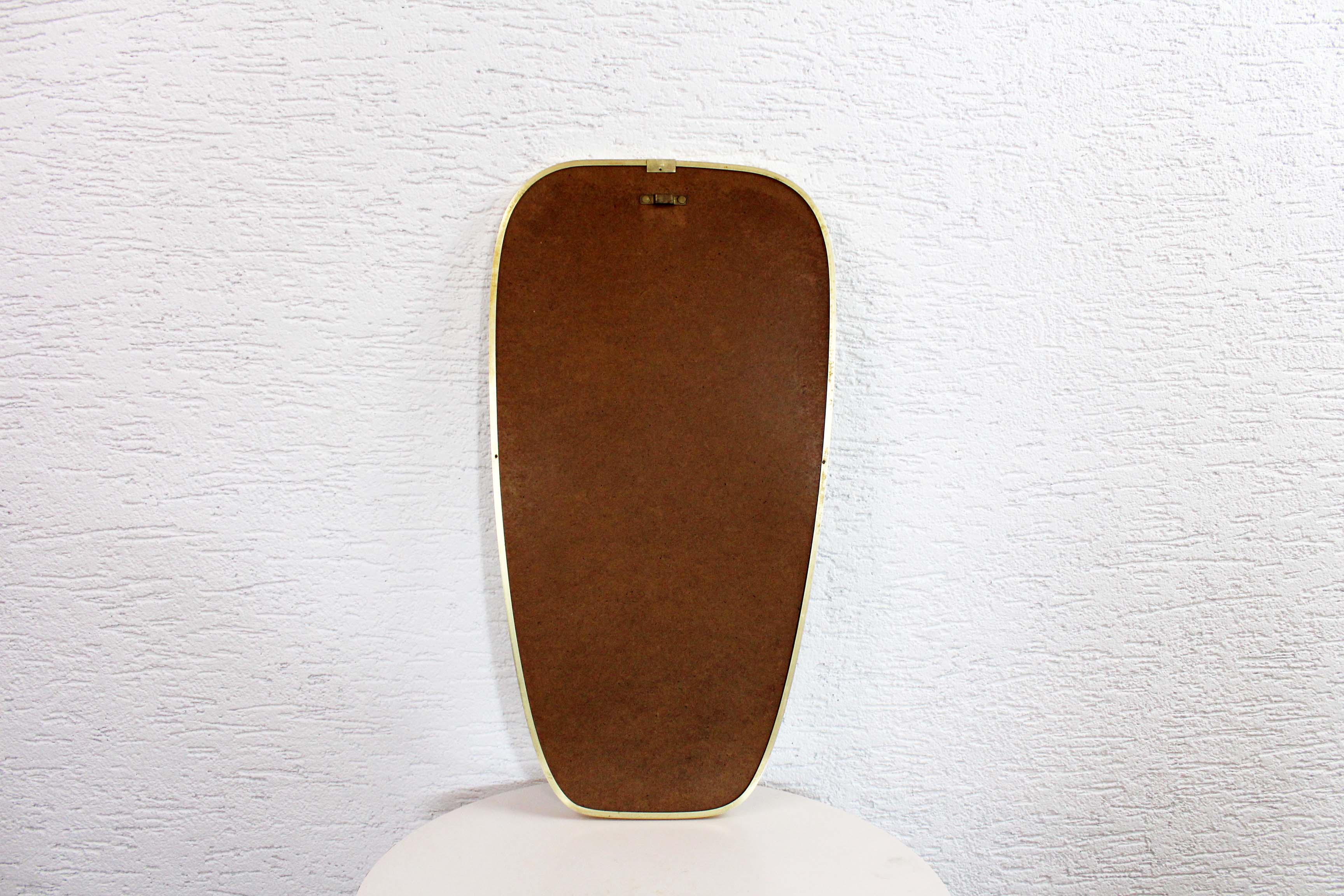 Asymmetrical mirror brass 60x31cm