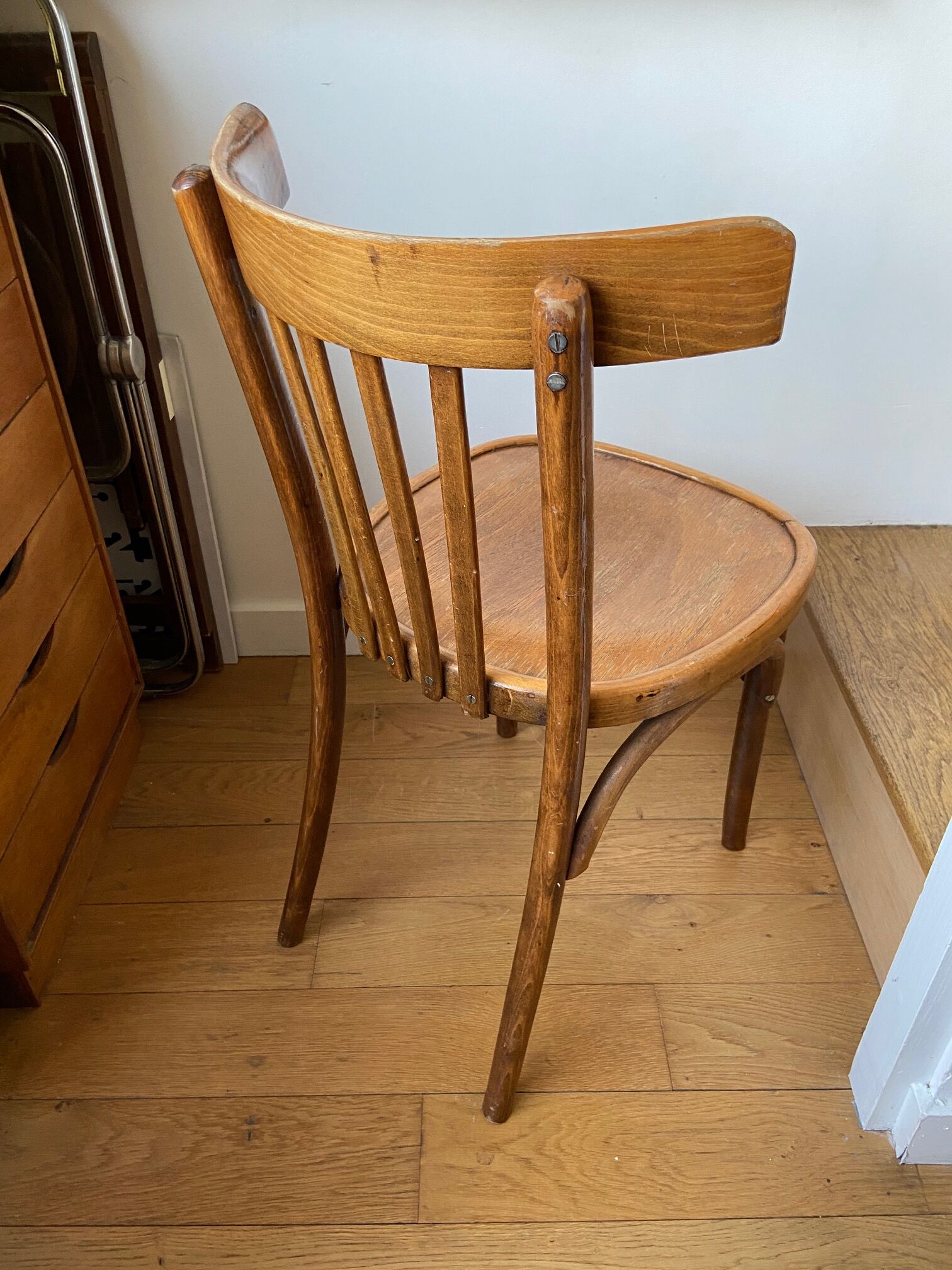 Pair of wooden bistro chairs