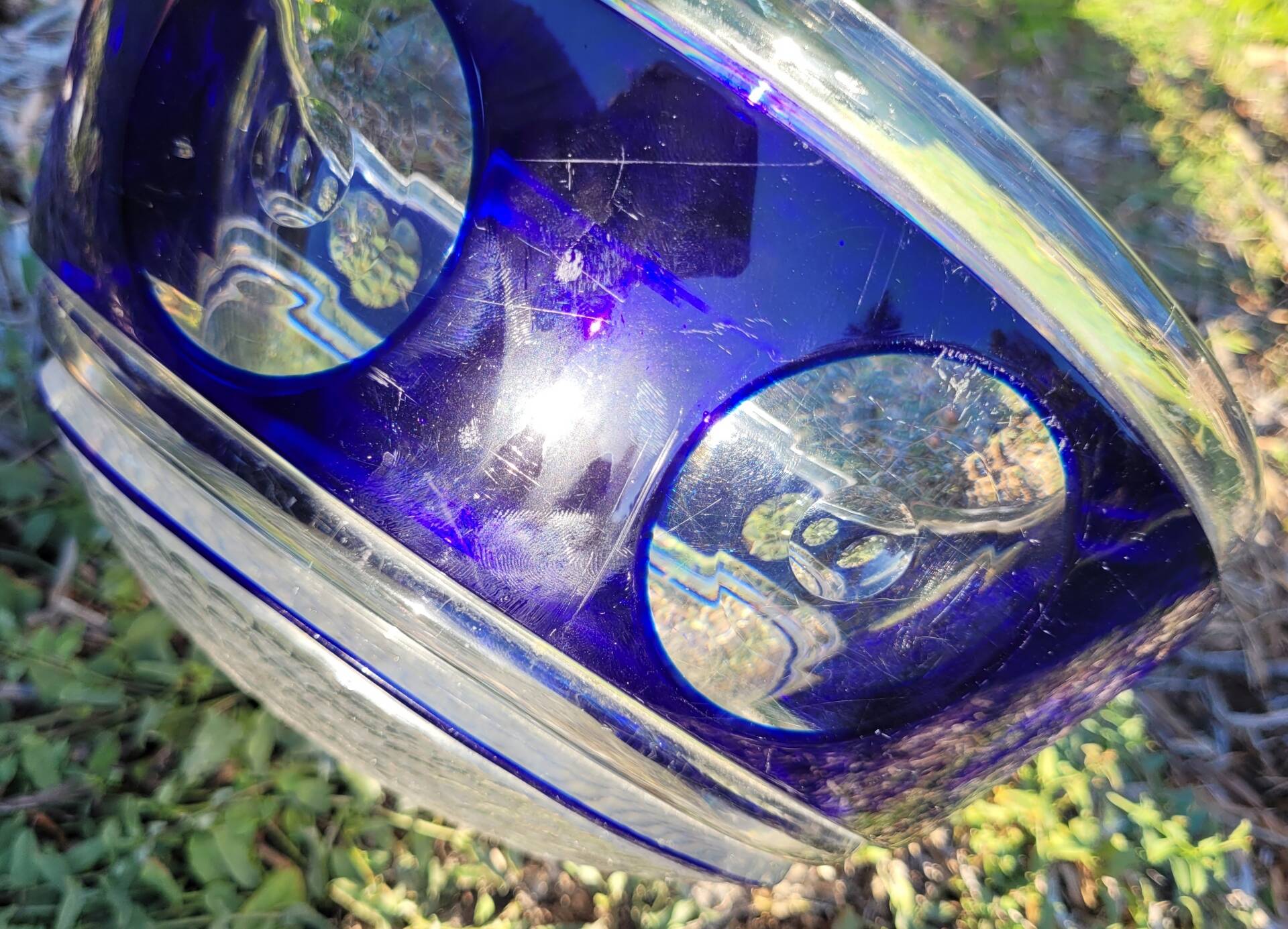 cobalt blue glass bowl with round lenses
