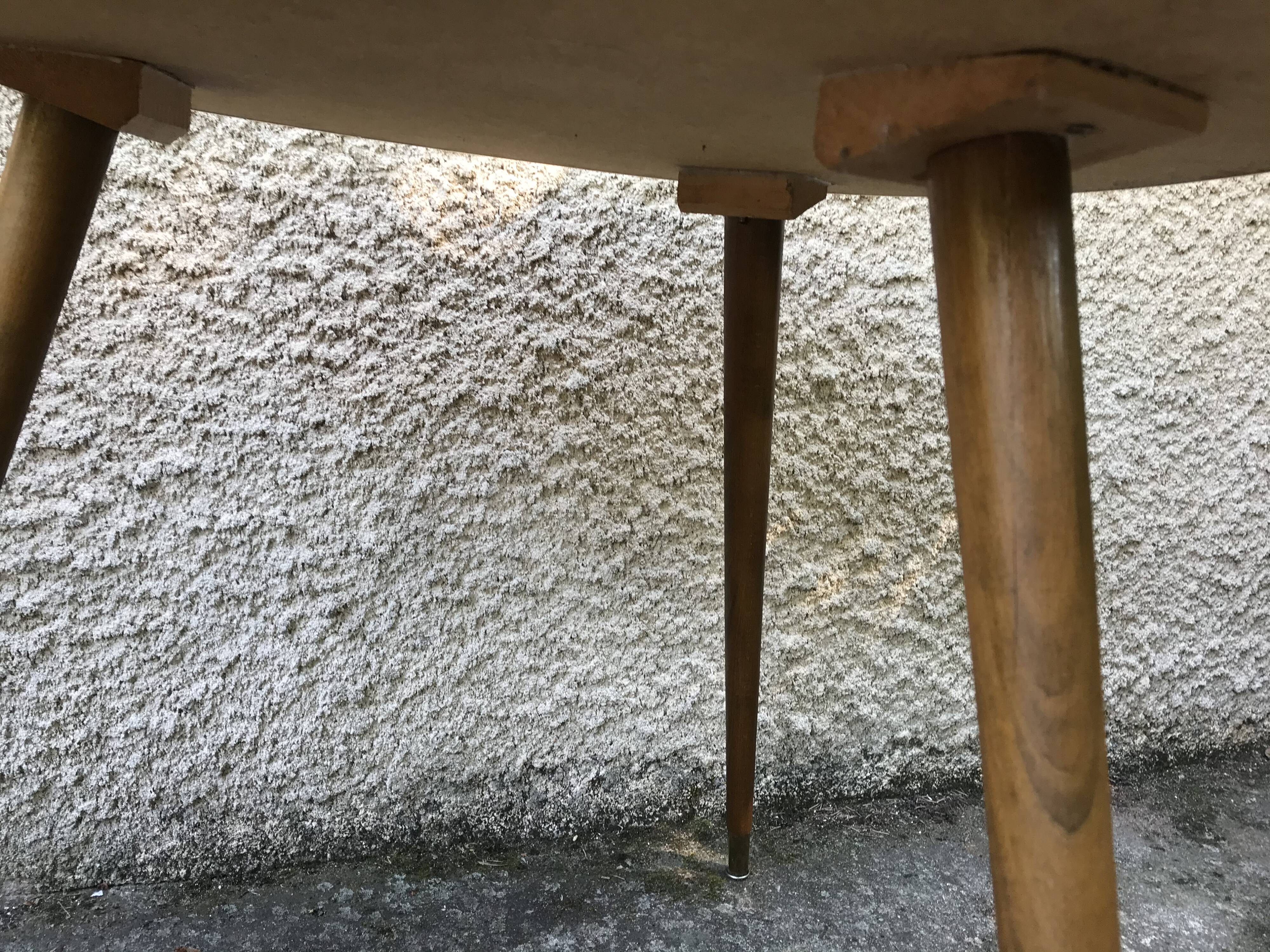 Free-form vintage tripod coffee table