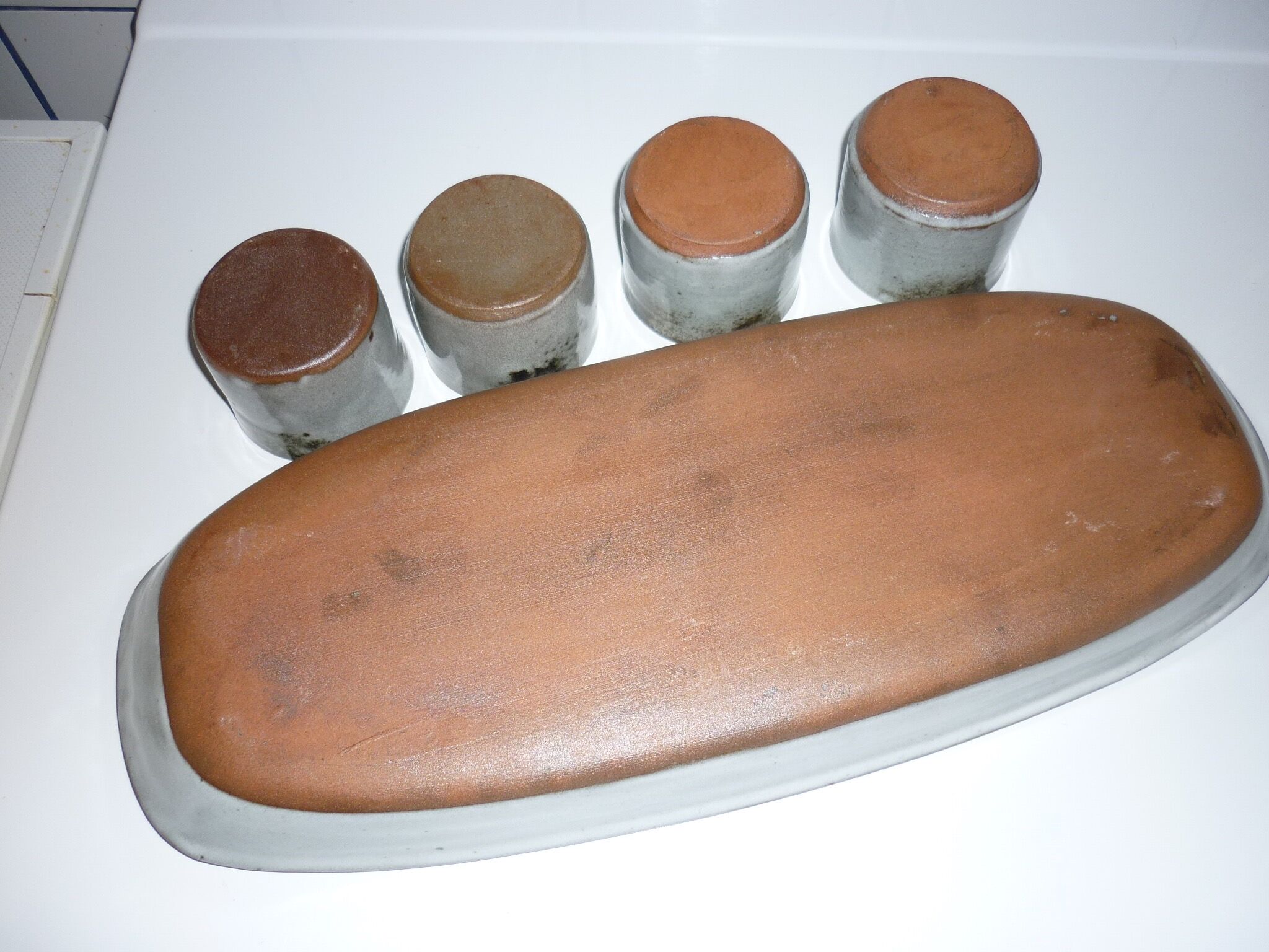 Ceramic fish dish and 4 pots for sauces from the 1960s